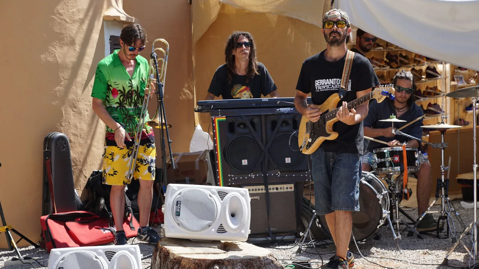 A band performing on an outdoor stage