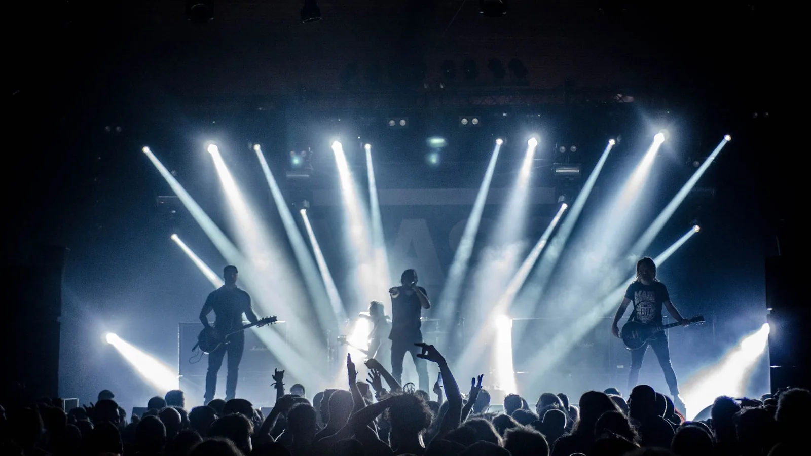 Concert stage lit by spotlights