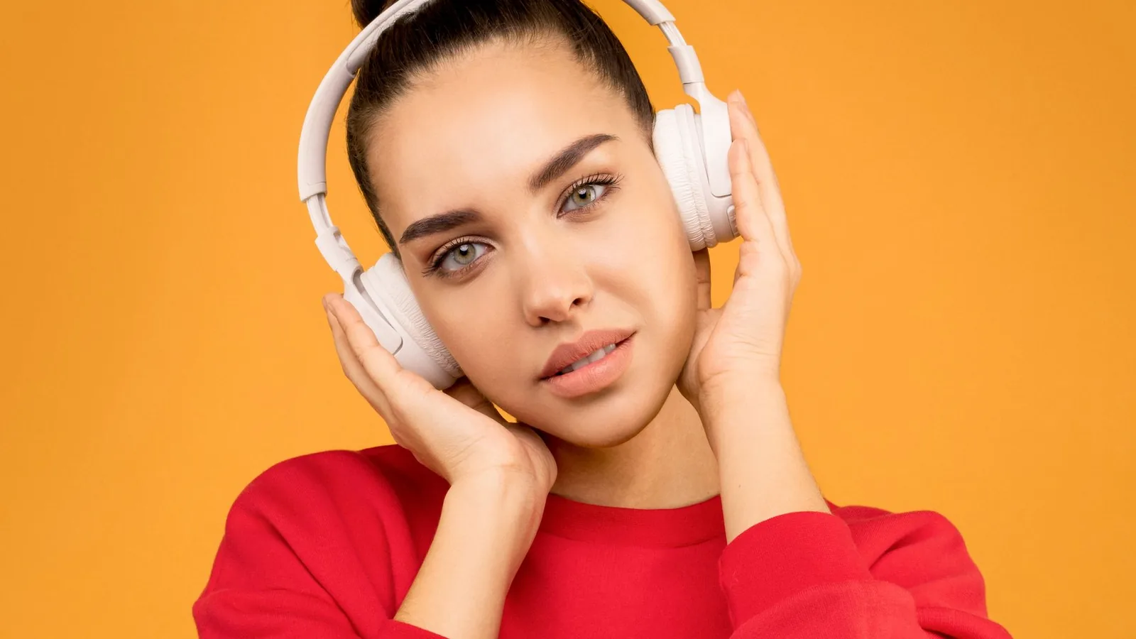 A woman wearing headphones
